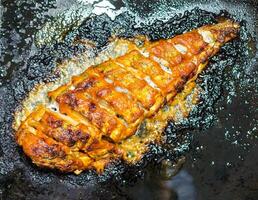 Baked cod on the tray photo