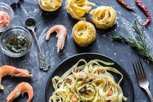 Tagliatelle pasta with seafood photo