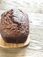 Loaf of banana-chocolate bread with chocolate cream photo