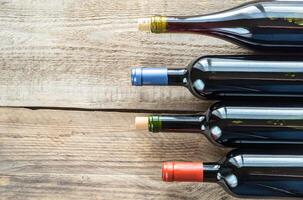 Bottles with red wine photo