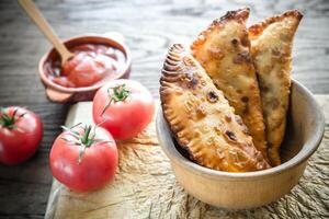 Meat Patties on the wooden background photo