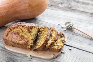 Pumpkin bread on the wooden board photo