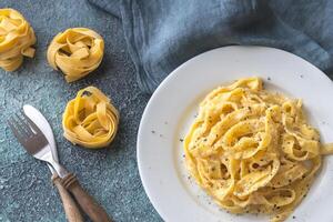 Portion of fettuccine Alfredo photo