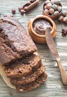 Loaf of banana-chocolate bread with chocolate cream photo