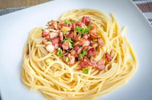 Pasta Carbonara with bacon and parmesan photo