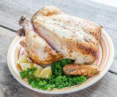 Grilled whole chicken photo