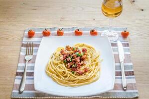 Pasta Carbonara with bacon and parmesan photo