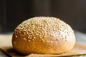 Sesame bun closeup photo