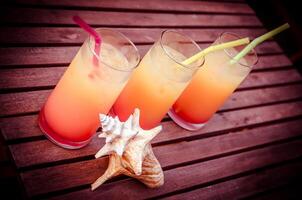 Three tequila sunrise cocktails photo