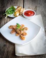 Shrimps with sauce photo