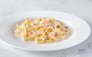 Portion of Shrimp Alfredo Pasta photo