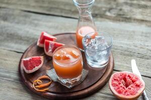 Grapefruit fresh on the wooden table photo