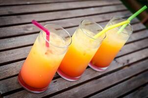 Three tequila sunrise cocktails photo