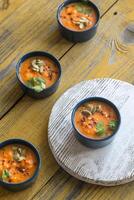 Bowls of pumpkin cream soup photo