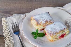 Mille-feuille with fresh cherry photo