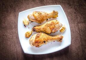 Grilled chicken drumsticks photo