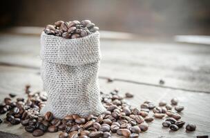 Coffee beans in the sackcloth bag photo