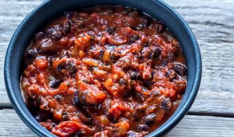 Bowl of black bean chili photo