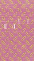 a pink and yellow pattern on a piece of paper video