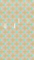 a close up of a patterned wallpaper with green and blue dots video