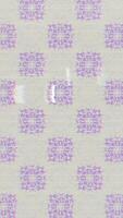 a pattern of purple and white flowers on a white background video