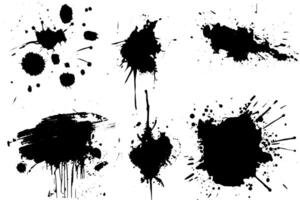 Ink Splatter Set Grunge Stains, Drops, and Splashes in Black and White. vector