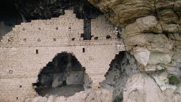 Drone footage showcases the ancient Christian rock church, an architectural relic dating back to the 7th century Eastern Roman Empire. Its historical significance as a religious site is highlighted video