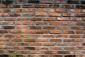 Red brick wall worn. photo