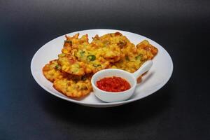 Indonesian food. Fried snacks, made of flour and corn photo