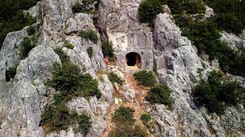 Drone captures tomb, ancient archaeology and ruined architecture. Footage highlights tomb, showing sarcophagus, history, and culture. Aerial view explores tomb, travel destination, revealing details video