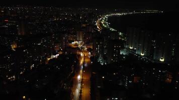 ville lumières, bâtiment grandes lignes lueur dans Mersin, avec ville lumières, bâtiment façades chatoyant, et ville lumières, bâtiment hauts éclairant le nuit video