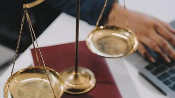 Judge gavel with Justice lawyers having team meeting at law firm background. Concepts of Law and Legal services. video
