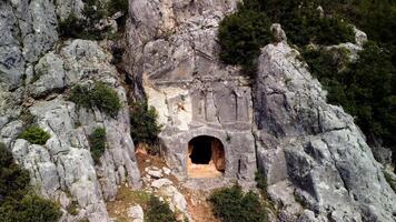 Drone view on tomb reveals ancient archaeology and culture. shows tomb from above, capturing ruined architecture. Explore history through drone footage of tomb, sarcophagus in context video