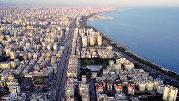 Explore Mersin, cityscape from the sky. Mersin, cityscape meets sea, highlighting Mersin, cityscape's role in urban education and scientific discovery video