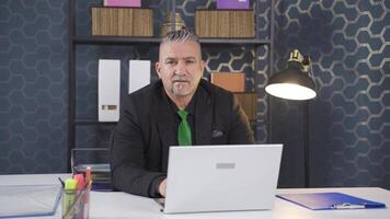 Businessman looking at camera with wow expression. video