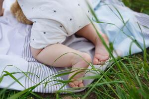 filming close up. small bare feet of children photo