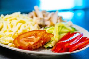 Yummy vegetarian food on a plate. Delicious traditional salad organic meal. photo