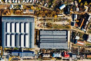 Commercial warehouse business manufacturing. Above view of factory building. photo