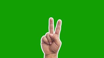 Two finger peace symbol on green background video