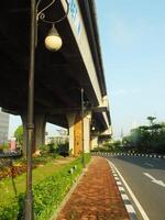 Surakarta, Central Java, Indonesia April 11, 2024. A sight seeing of Main Roads Slamet Riyadi Street in the morning. Not busy yet. People still preparing for their activity photo