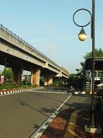 Surakarta, Central Java, Indonesia April 11, 2024. A sight seeing of Main Roads Slamet Riyadi Street in the morning. Not busy yet. People still preparing for their activity photo
