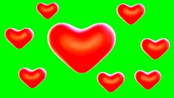 a red heart on a green screen video