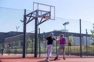 Together is better. Family playing basketball together. photo