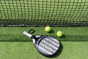 Paddle tennis racket and ball photo