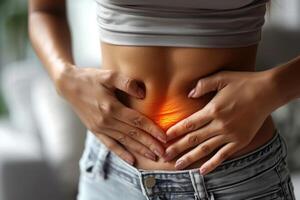 Young woman in menstrual pain, portrayal of the discomfort and agony experienced during menstruation, empathizing with the struggles of menstrual periods of cramps and distress. photo