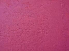 industrial style pink plaster texture background photo