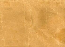 crumpled brown paper texture background photo