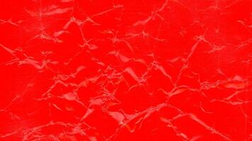 red crumpled paper texture background photo