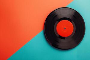 Classic Vinyl Record on Bright Blue and Orange Background photo