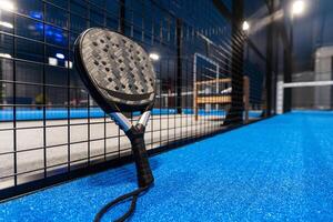 Paddle tennis objects and court. photo